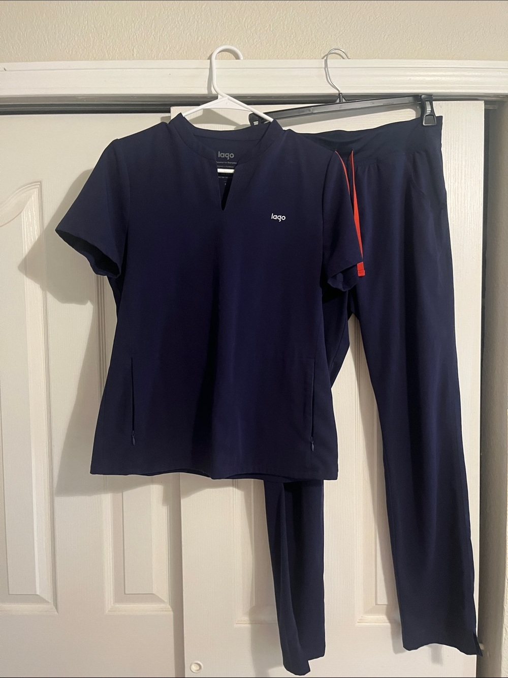 Lago scrubs women’s S navy w/ orange drawstring